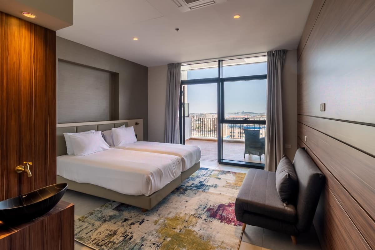 Suite with a separate seating area at Hotel Yirmiyahu 33, Romema, Jerusalem